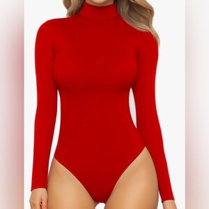 Women’s red high cut thong bodysuit.Mock turtle neckline, long sleeves.Size M